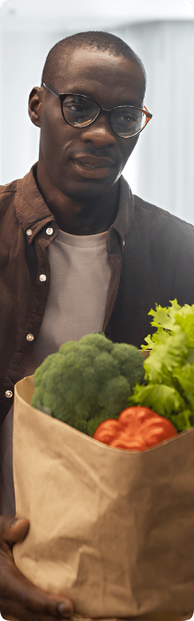 Manna customer carrying fresh groceries
